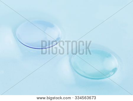 Macro detail of modern rigid gas permeable contact lenses (GP) in storage solution
