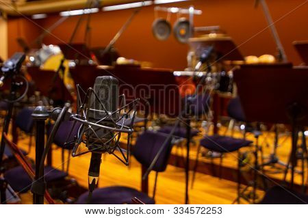 Microphone With A Stand Close Up. Instruments Of The Orchestra In Philharmonia. Prague, 15.11.2019