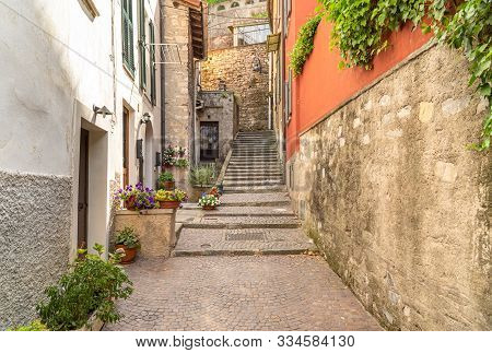 Narrow Street Of Ancient Village Torno, Overlooking Lake Como, Italy