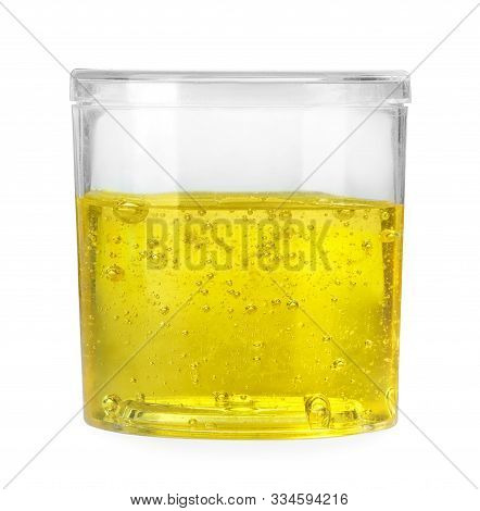Yellow Slime In Plastic Container Isolated On White. Antistress Toy