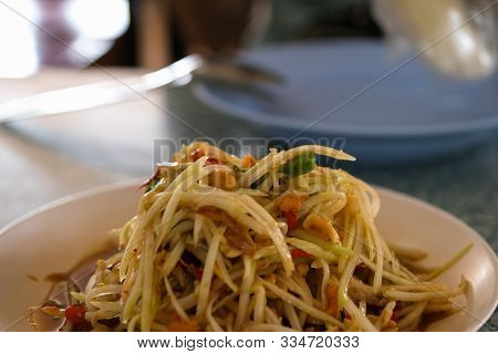 The Close Up Somtum. Thai Spicy Green Papaya Salad. Close Up Somtum. Thai Spicy Green Papaya Salad S