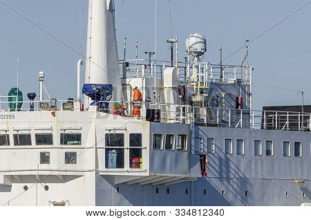 New Bedford, Massachusetts, Usa - November 16, 2019: Crewmen Working Aboard Survey Vessel Kommandor 