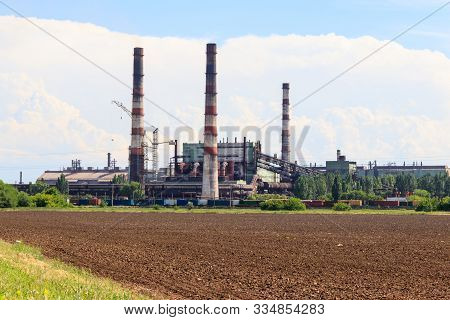 Industrial Landscape. View Of Factory In Nikopol, Dnepropetrovsk Region. Nikopol Ferroalloy Plant Is