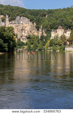 La Roque-gageac, Dordogne, France - September 7, 2018: Canoeing And Tourist Boat, In French Called G