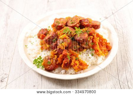 rougail saucisse, creole dish with sausage, tomato sauce and spice with rice