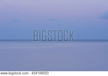 Beautiful Vibrant Late Summer Sunset Over Pentewan Sands On English Cornwall Coast With Long Exposur