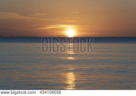 Beautiful Vibrant Late Summer Sunset Over Pentewan Sands On English Cornwall Coast With Long Exposur