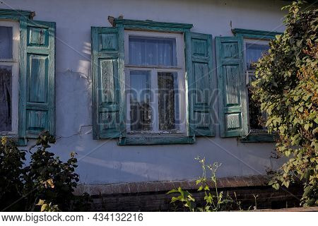 Ukraine. Fragment Of A Traditional Ukrainian Wooden Old House. One-story Houses. National Architectu