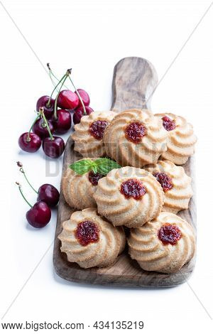 Qurabiya  Cookie Shortbread With Jam On Serving Board Isolated On White