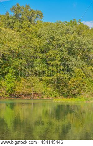 The Current River Flowing Through The Wilderness Of Ozark National Scenic Riverway In Missouri
