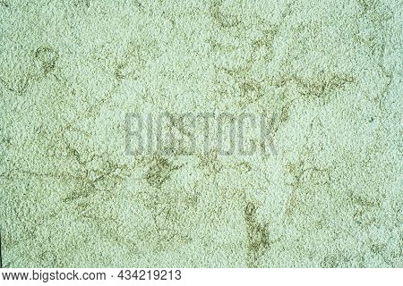 Green Tide, Celadon Concrete Old Wall. Cement Texture. Scuffs And Cracks. Celadon