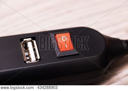 Black Usb Hub On A Wooden Background Close Up