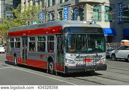 San Francisco - Mar. 15, 2014: San Francisco Municipal Railway Muni Public Hybrid Electric Bus On Ma