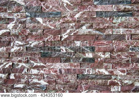 The Background Of The Wall Is Made Of Strips Of Natural Marble Rosso Levanto Cherry Color With A Bea