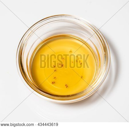 Home Remedy For Catching Fruit Flies And Small Insects With Glass Bowl Of Cider Vinegar And Drop Of 