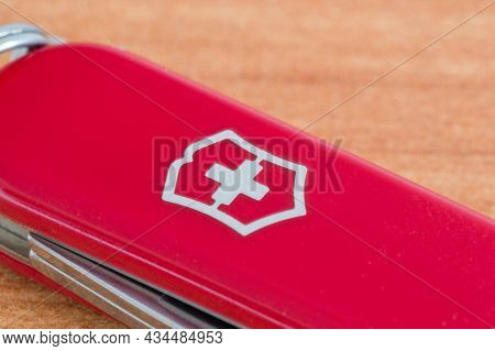 Pruszcz Gdanski, Poland - July 17, 2021: Logo Of Victorinox On Red Swiss Army Knife Victorinox.