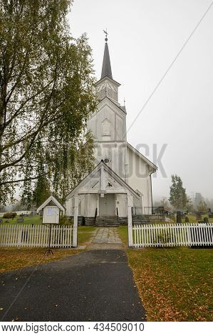 Nore Church - White Wooden Church In Nore, Norway