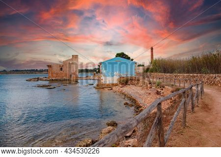 Vendicari area of ??the Tonnara at sunset. Sicily.