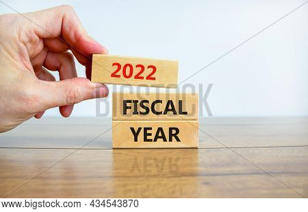 New Fiscal Year 2022 Symbol. Wooden Blocks With Words '2022 Fiscal Year'. Beautiful Wooden Table, Wh