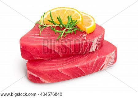 Fresh Tuna Fish Fillet Steak With Rosemary And Lemon Isolated On White Background With Clipping Path