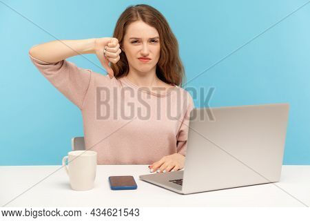 I Dont Like. Displeased Woman Employee Showing Thumbs Down, Dislike Gesture, Expressing Disapproval,
