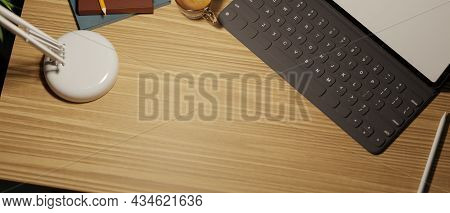 Top View, Close-up Of Workspace With Copy Space, A Portable Tablet, And Decor Under Light From Table