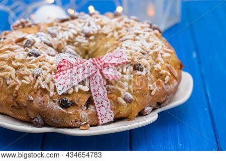 Portuguese Christmas Cake Bolo De Rainha On Blue Wooden Background