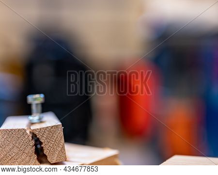 Selective Focus On Cracked And Split Wood From Not Drilling A Pilot Hole Before Driving A Screw
