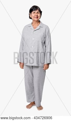 Senior woman in gray pajamas nightwear apparel full body
