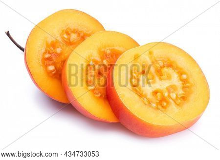 Ripe tamarillo fruits with tamarillo slices  isolated on a white background.