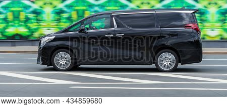 Moscow, Russia - September 2021: Toyota Alphard Executive Lounge Rides On Street. Fast Moving Miniva