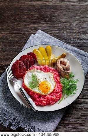 Labskaus, Corned Beef, Mashed Potatoes With The Beetroot Topped With Fried Eggs, Sliced Beets, With 