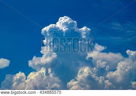 The Clouds Are Huge White Swirling In Blue