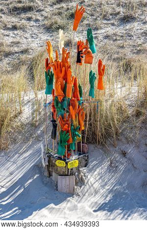 Petten Aan Zee, Noord-holland, Netherlands. April 17, 2021. Gloves At The Wall Of Shame, An Open-air