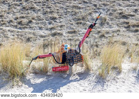 Petten Aan Zee, Noord-holland, Netherlands. April 17, 2021. The Contortionist At The Wall Of Shame, 