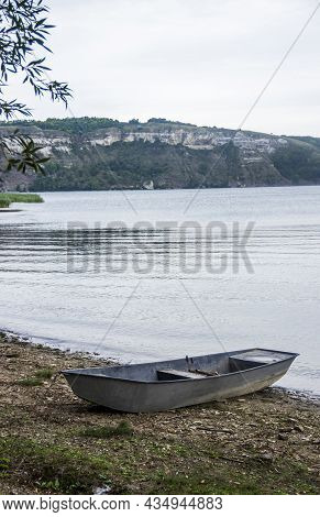 Wooden Boat On The Dnister River Bank