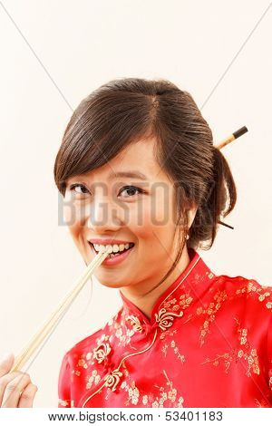 chinese woman with chopstics