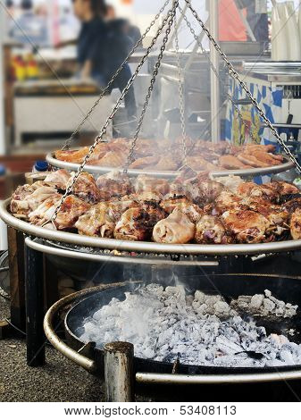 Roasted Pork Knuckle  On   Brazier In Country Fair