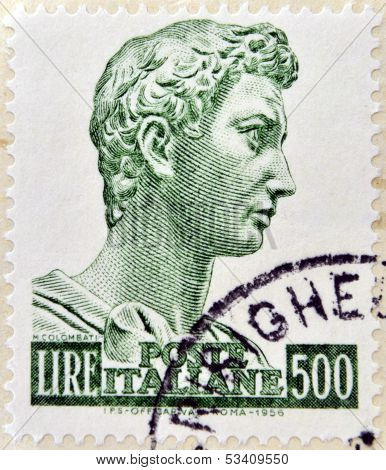 stamp printed in Italy shows sculpture of St. George by the sculptor Donatello in 1416