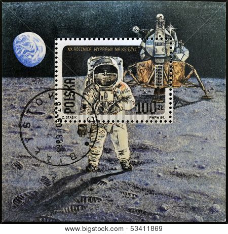 POLAND - CIRCA 1989: A stamp shows Neil Armstrong lunar module 