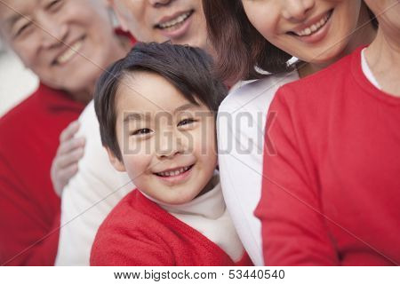 Smiling multi-generational family