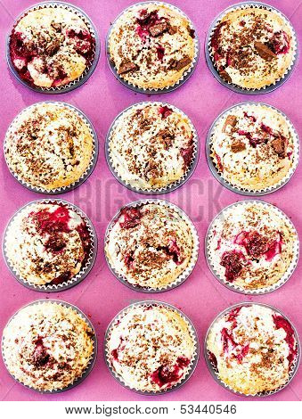 Chocolade And Cherry Festive Muffins In A Pink Colored Baking Tray May Use As  Food Background