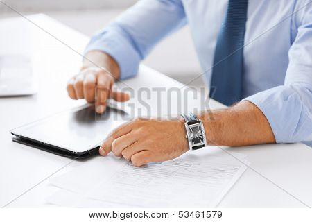 business, office, school and education concept - businessman with tablet pc in office