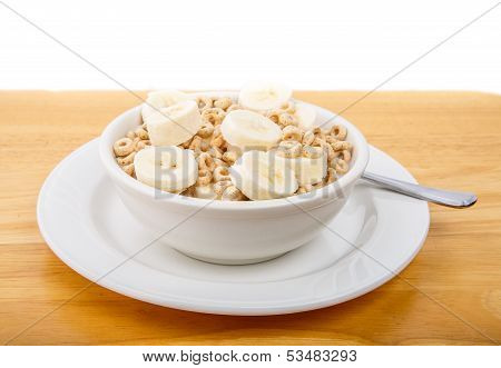 Sliced Bananas On Toasted Oat Cereal