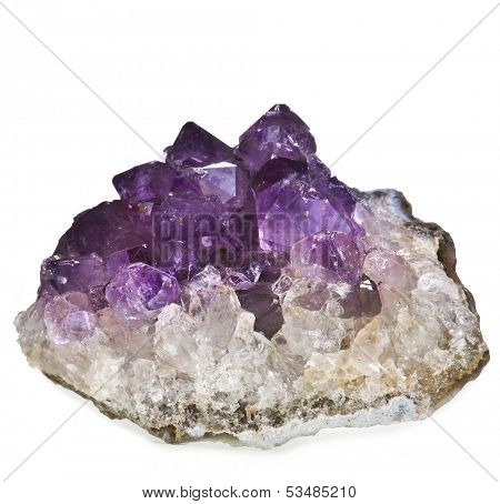 Beautiful amethyst druse close up isolated on white background - semiprecious gem used for jewels 