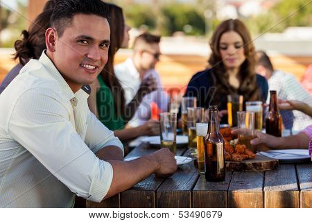 Handsome man with his friends