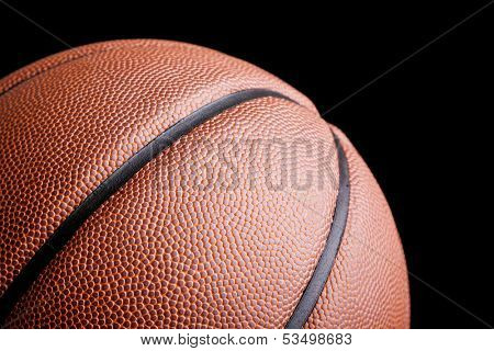 Basketball ball against dark background