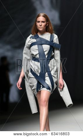 ZAGREB, CROATIA - APRIL 10 : Fashion model wears clothes made by Petra Vuletic and Sasa Hortig on 