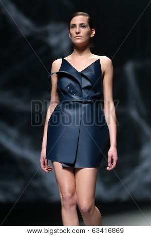 ZAGREB, CROATIA - APRIL 10 : Fashion model wears clothes made by Petra Vuletic and Sasa Hortig on 