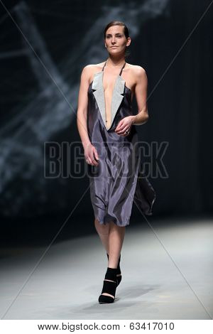 ZAGREB, CROATIA - APRIL 10 : Fashion model wears clothes made by Petra Vuletic and Sasa Hortig on 